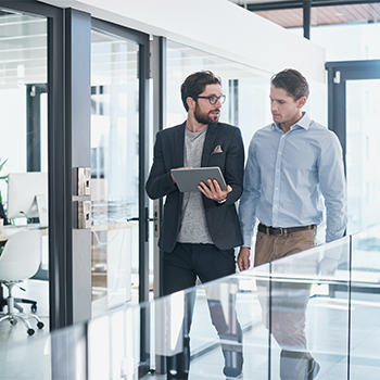 people walking with a tablet