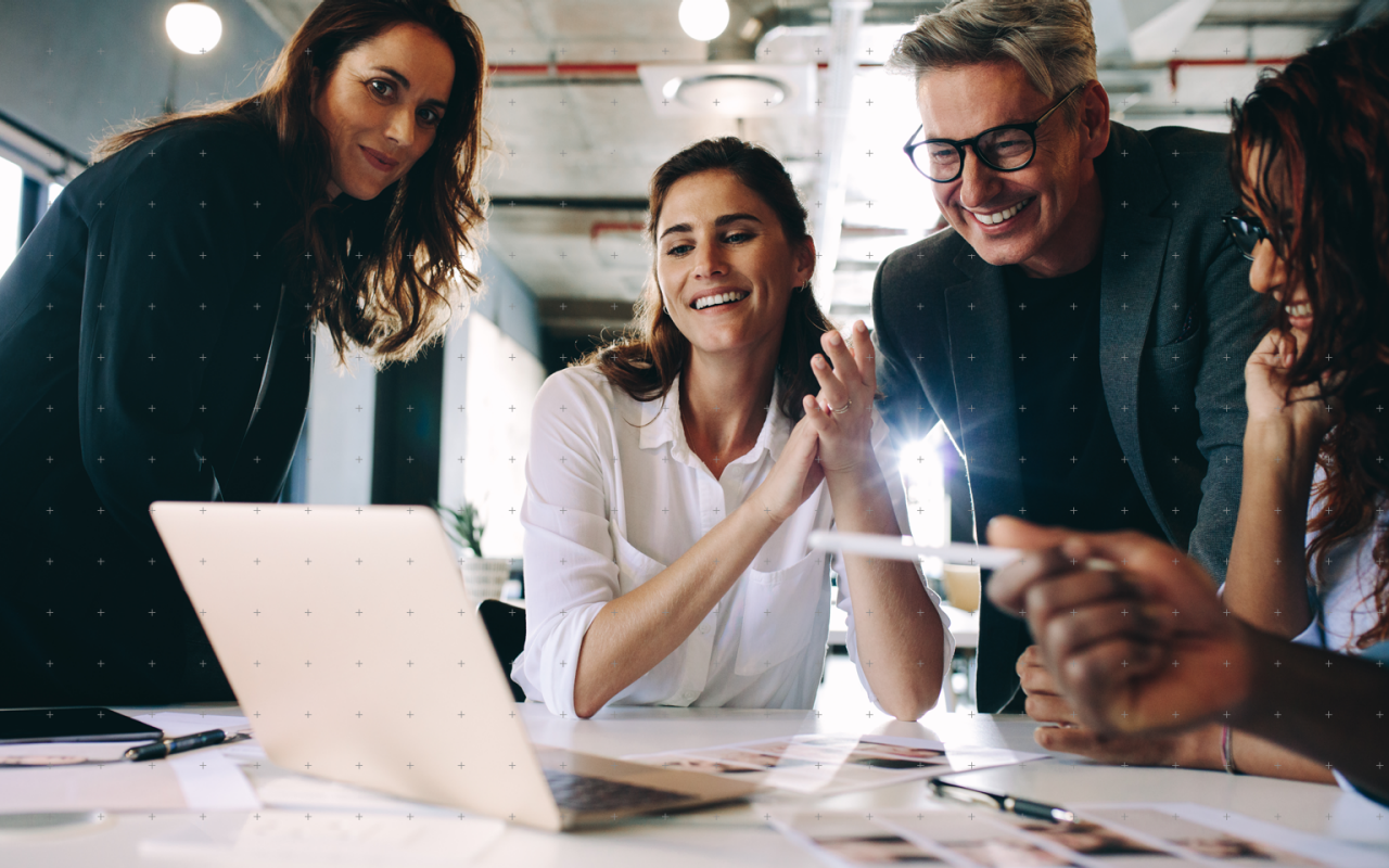 colleagues working on a computer